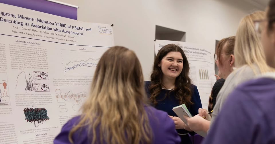 Students explaining research findings