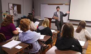 UNA President Ken Kitts teaching class