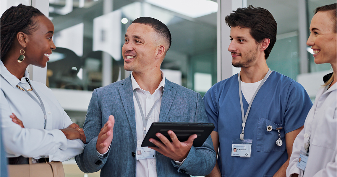 3 doctors and an admin talking