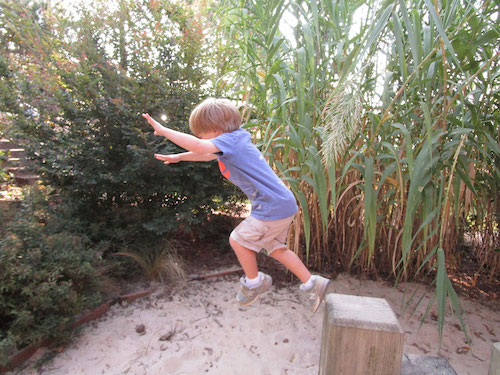 Child jumping and playing