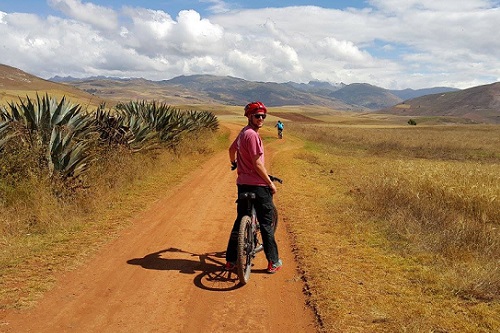 Students take a mountain bike ride through the mountains of Peru.