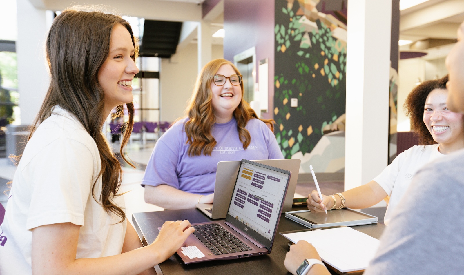 students with smiles after completing registration